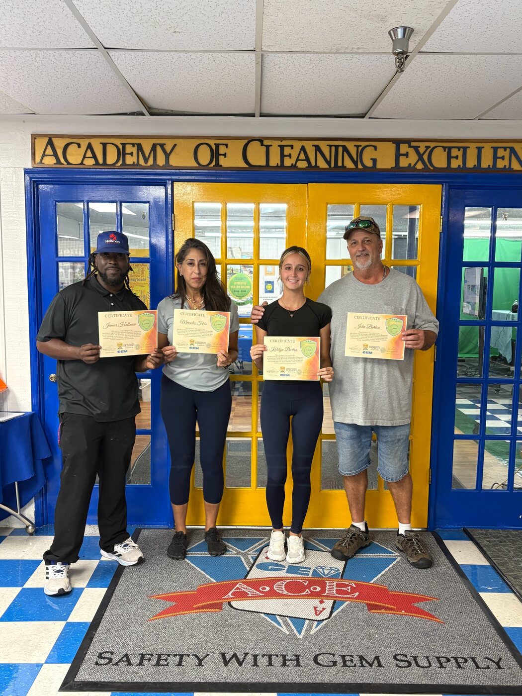 Academy graduates with their certificates